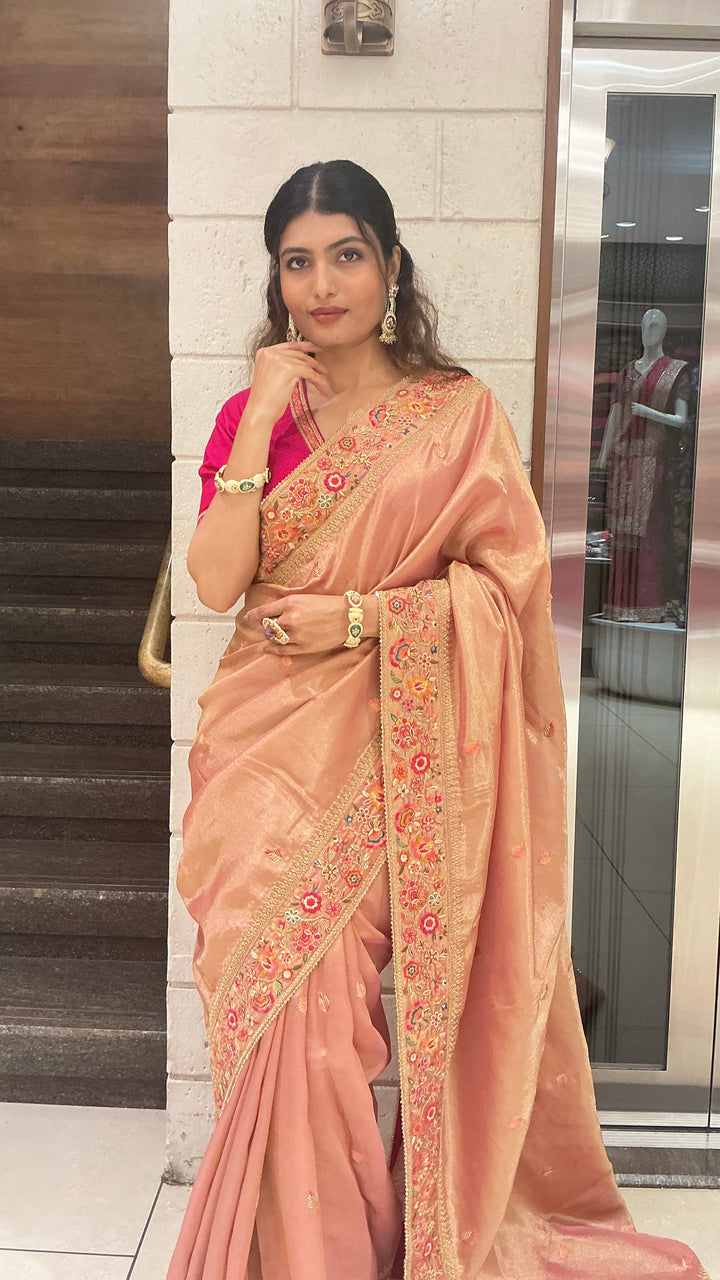 Elegant Peach Gold Designer Saree with Floral Embroidered Border & Rani Pink Blouse