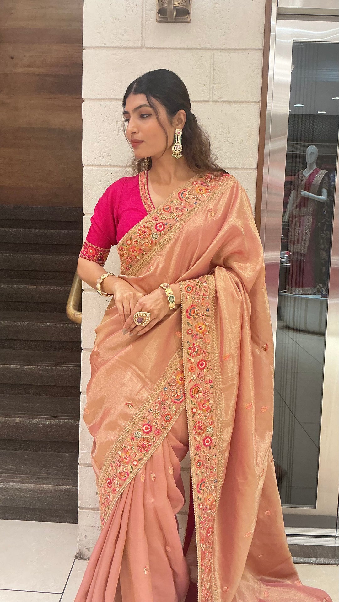 Elegant Peach Gold Designer Saree with Floral Embroidered Border & Rani Pink Blouse