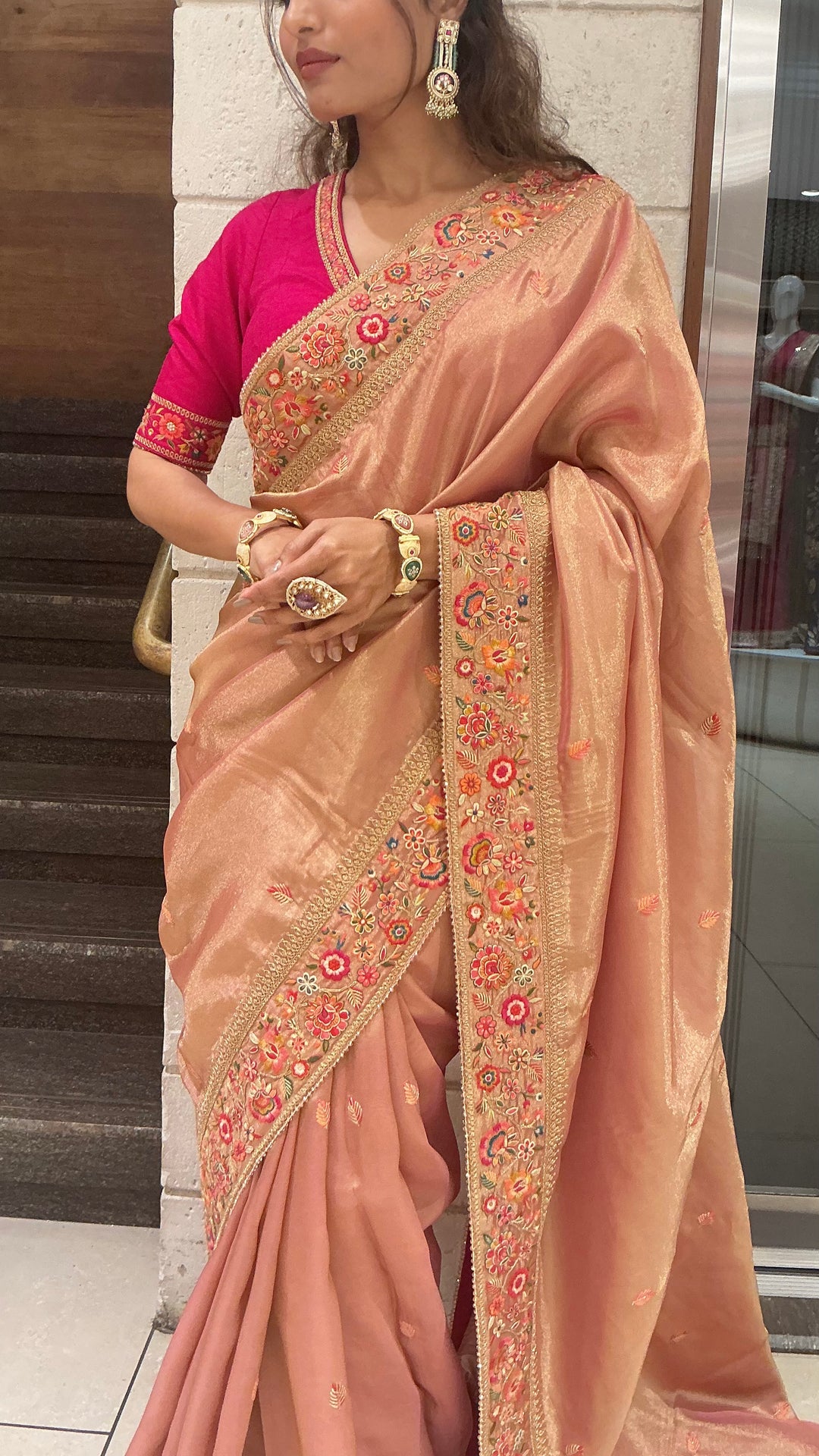 Elegant Peach Gold Designer Saree with Floral Embroidered Border & Rani Pink Blouse