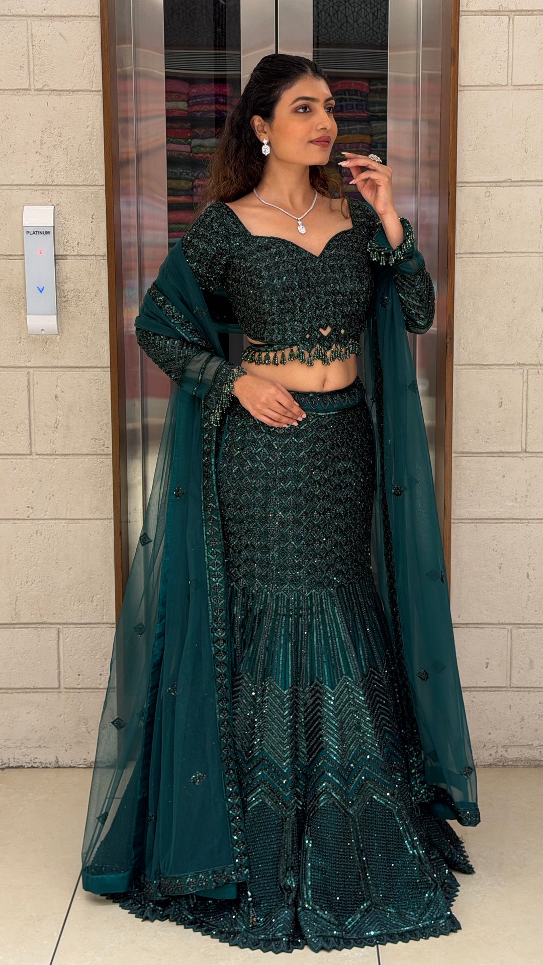 Emerald Green Designer Mermaid Lehenga Set with Sequins Embellishment & Net Dupatta