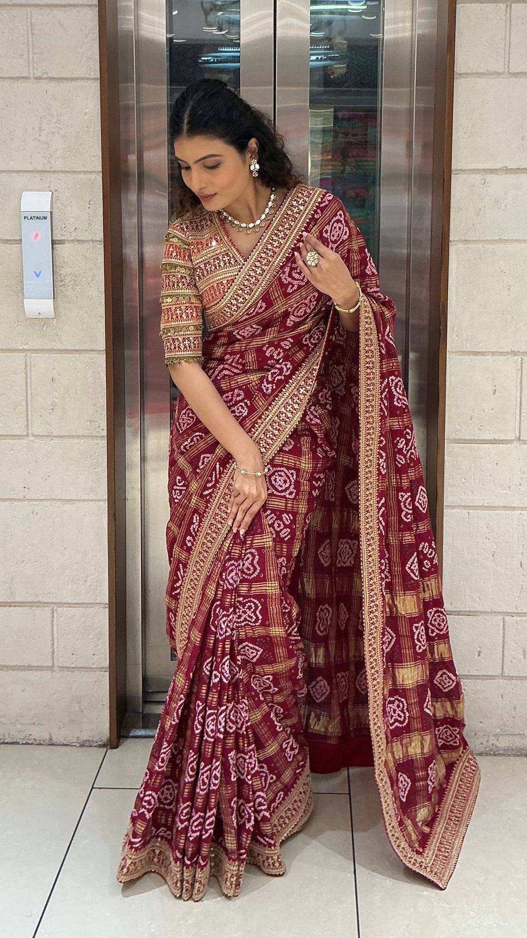 Maroon Bandhani Printed Saree with Traditional Woven Border