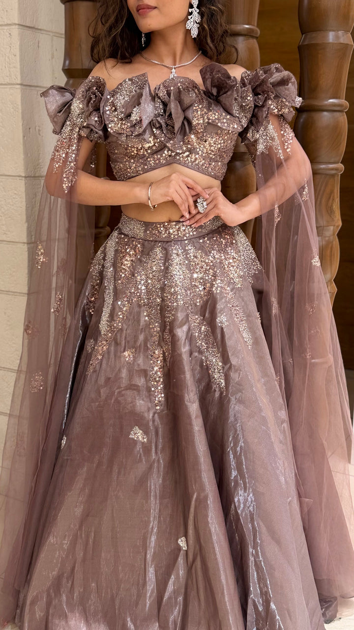 Mauve Shimmer Lehenga Set with Floral Ruffle Blouse & Cape Dupatta