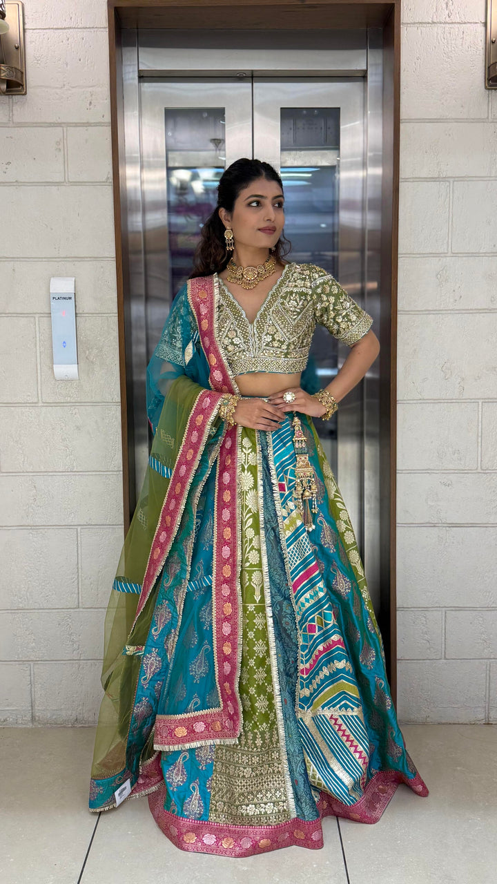 Teal & Olive Green Multicolor Patola Banarasi Lehenga Set with Heavy Hand-Embroidered Blouse
