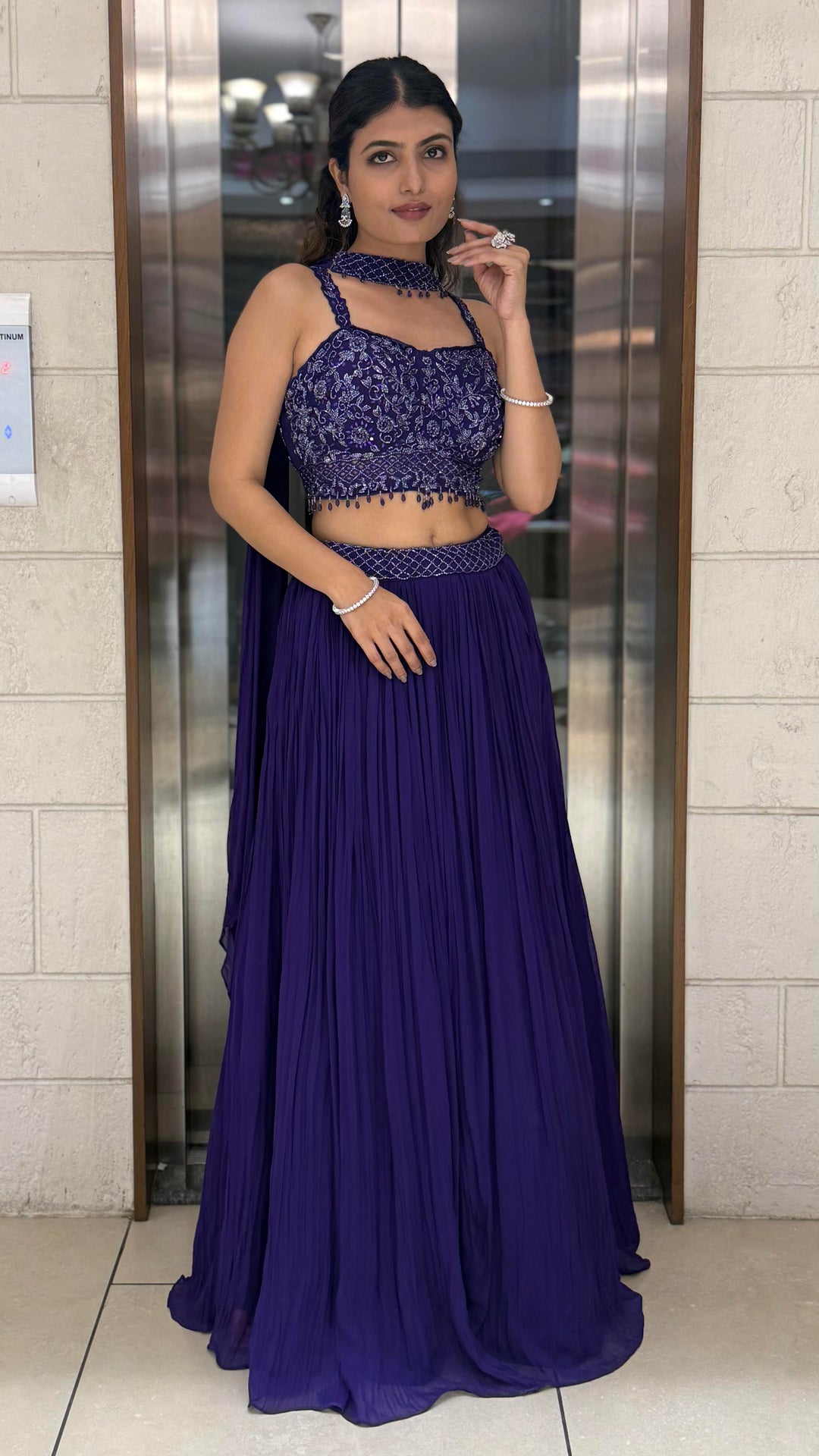 Royal Purple Embroidered Designer Lehenga Set with Pleated Skirt & Stylish Choker Blouse