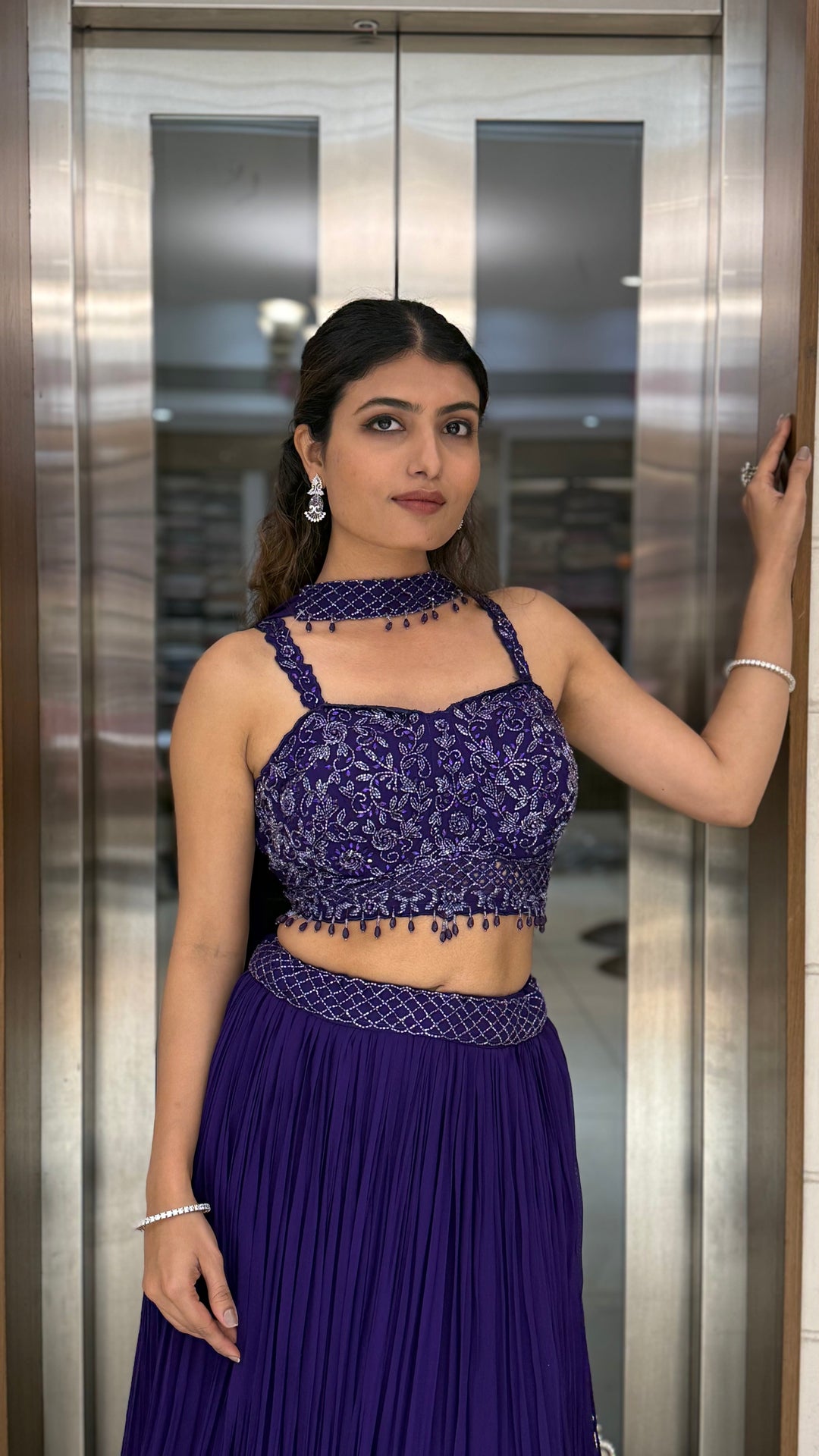 Royal Purple Embroidered Designer Lehenga Set with Pleated Skirt & Stylish Choker Blouse