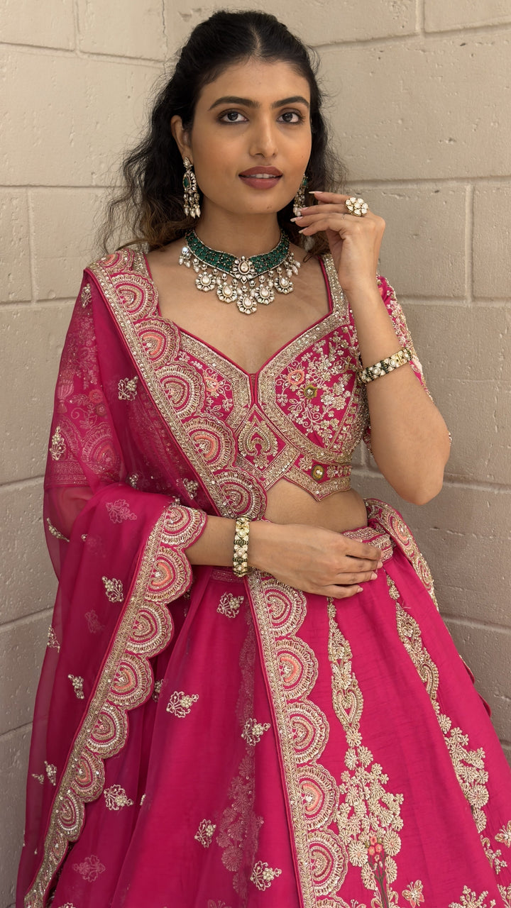 Rani Pink Embroidered Bridal Lehenga Set with Net Dupatta
