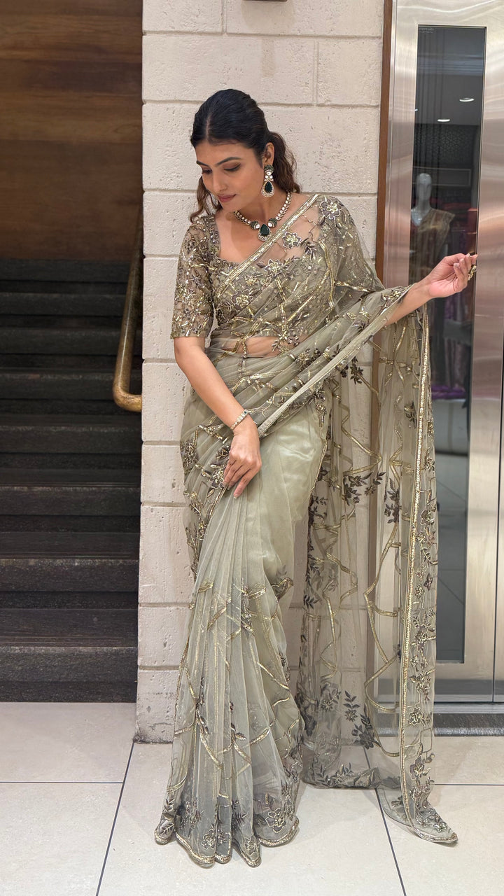 Pistachio Green Heavy Embroidered Net Saree with Matching Designer Blouse