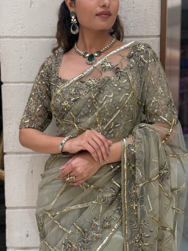Pistachio Green Heavy Embroidered Net Saree with Matching Designer Blouse