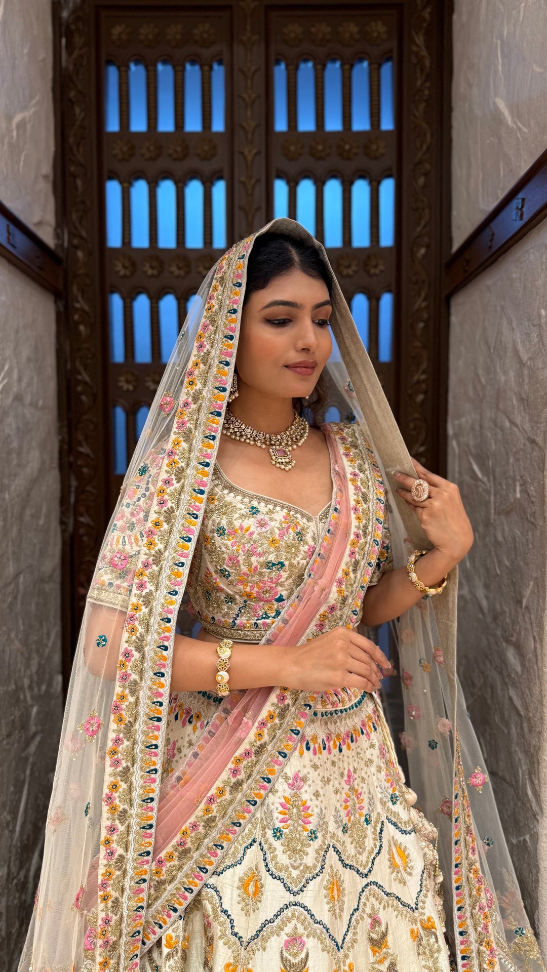 Ivory Multi-Color Heavy Embroidered Bridal Lehenga with Dupatta