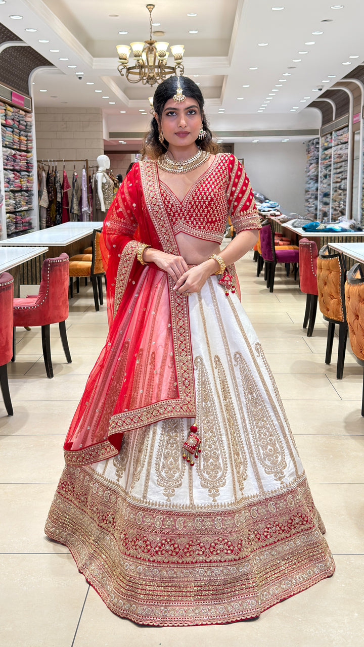 Ivory & Crimson Bridal Lehenga with Intricate Gold Embroidery and Designer Dupatta