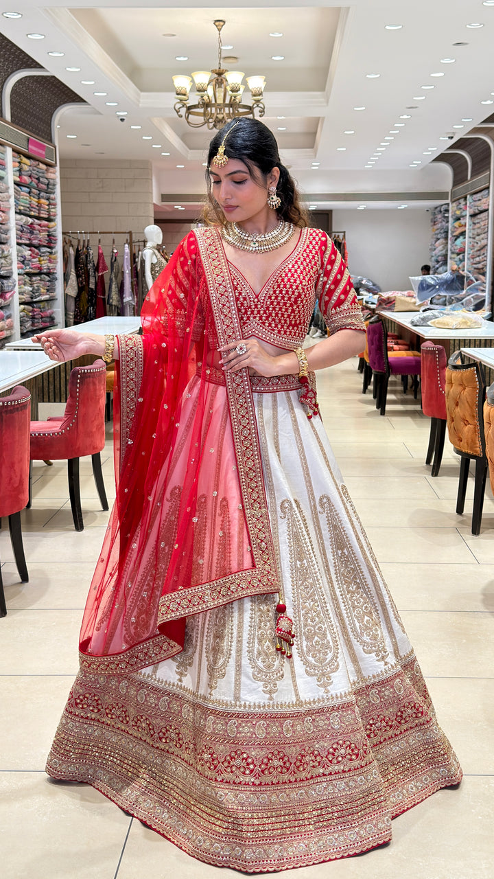 Ivory & Crimson Bridal Lehenga with Intricate Gold Embroidery and Designer Dupatta