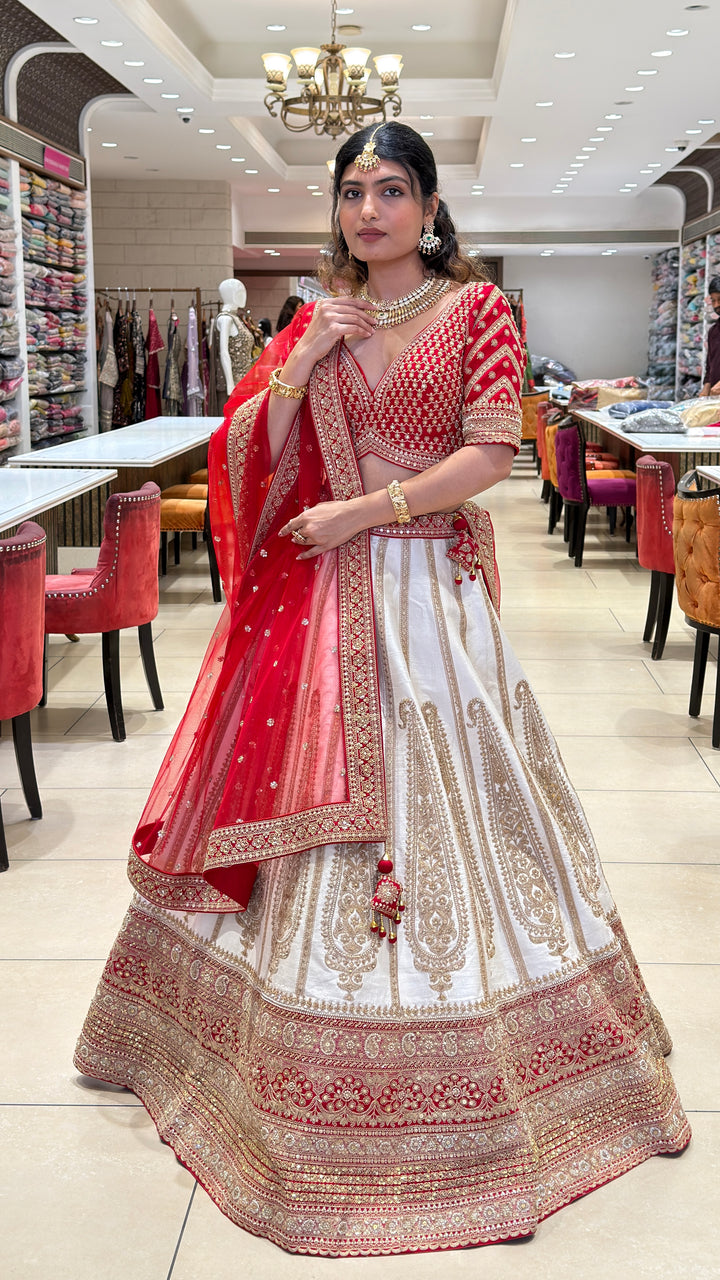 Ivory & Crimson Bridal Lehenga with Intricate Gold Embroidery and Designer Dupatta