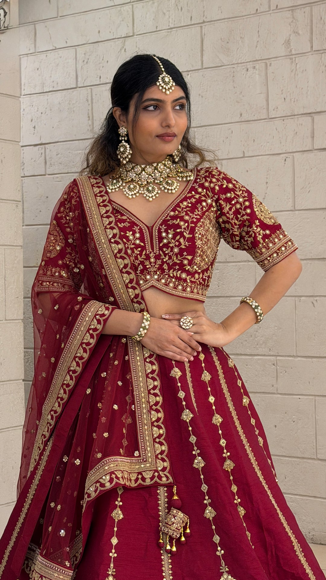 Wine Red Bridal Lehenga Set with Heavy Gold Embroidery & Designer Net Dupatta
