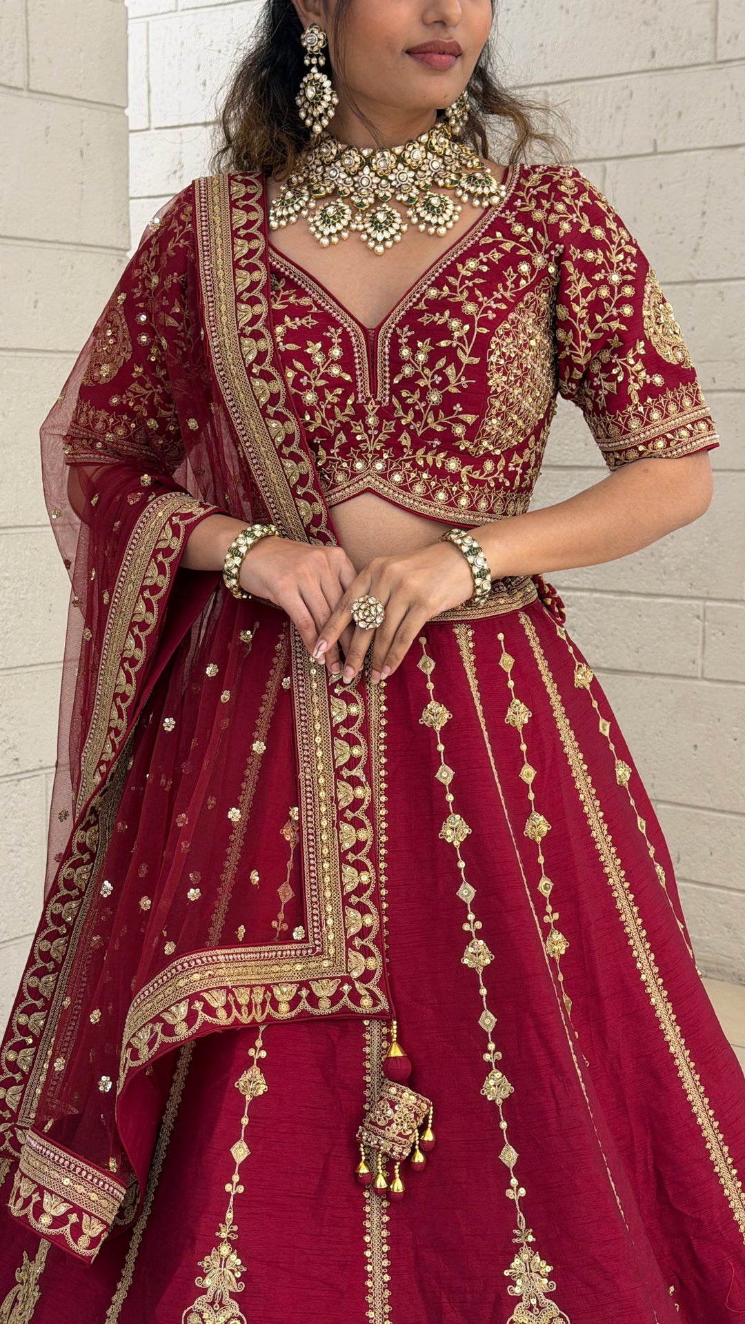 Wine Red Bridal Lehenga Set with Heavy Gold Embroidery & Designer Net Dupatta