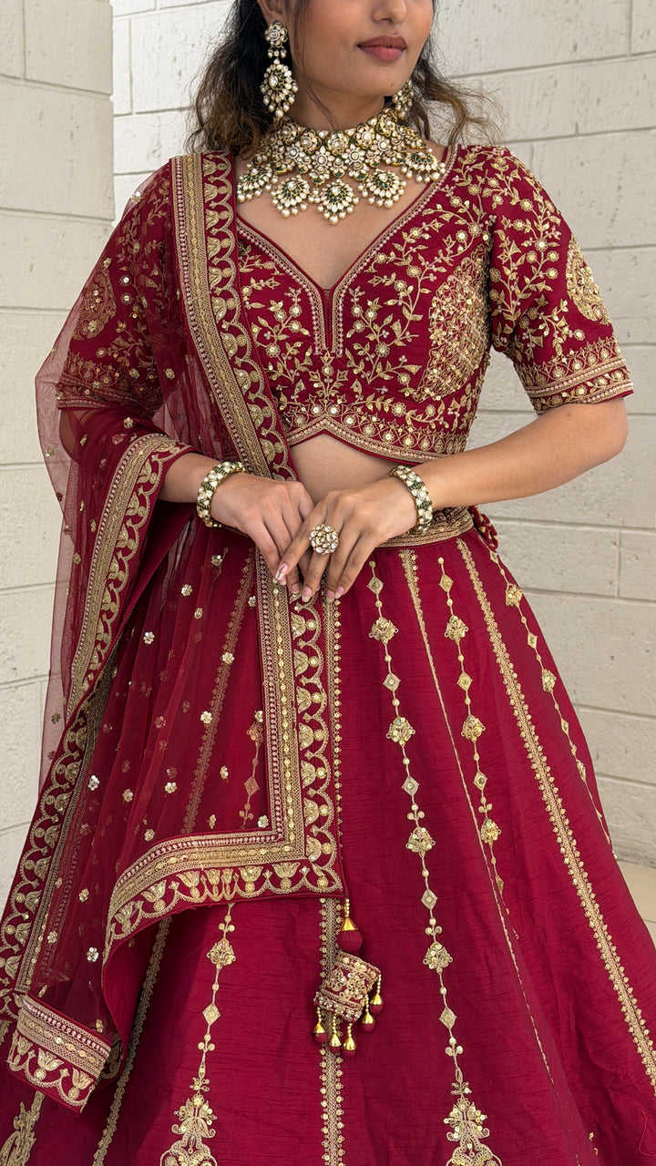Wine Red Bridal Lehenga Set with Heavy Gold Embroidery & Designer Net Dupatta