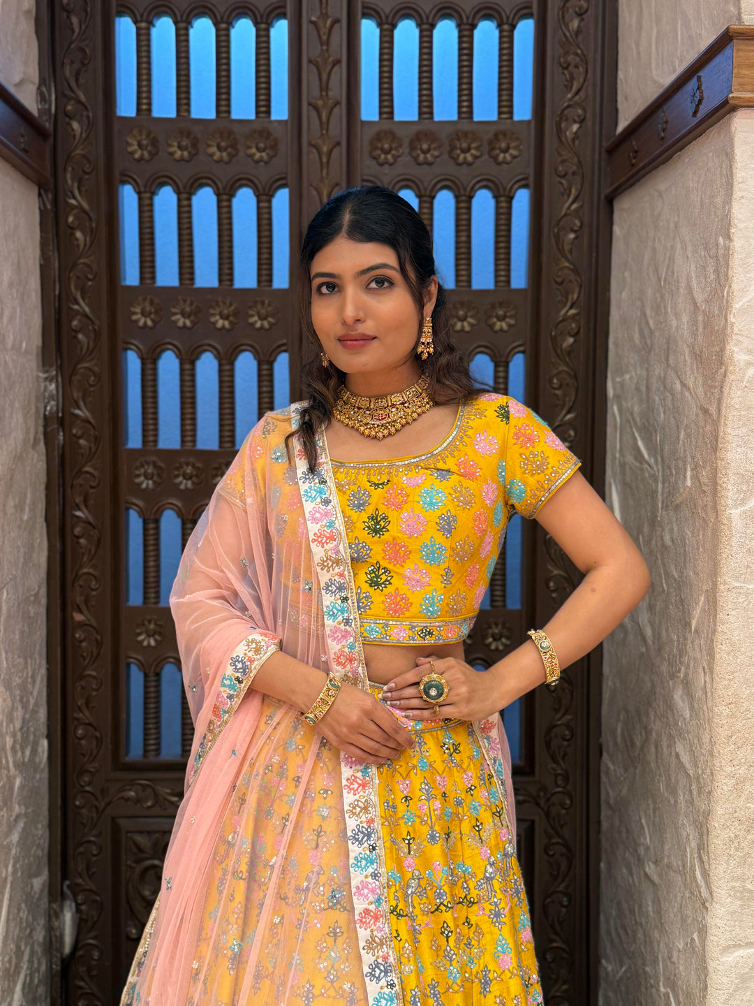 Mustard Yellow Floral Embroidered Lehenga Set with Soft Pink Net Dupatta