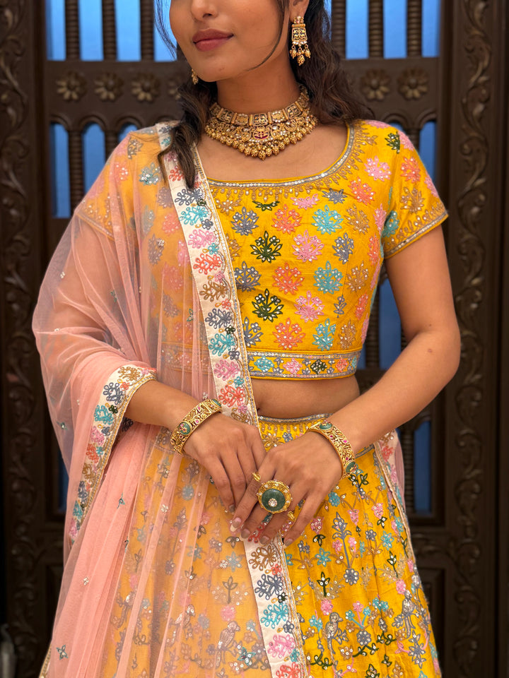 Mustard Yellow Floral Embroidered Lehenga Set with Soft Pink Net Dupatta