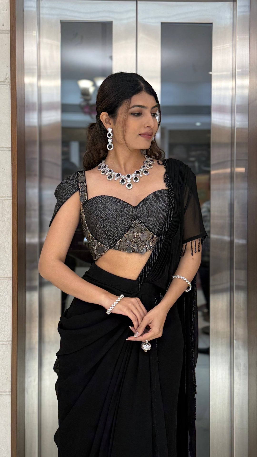 Midnight Black Pre-Draped Saree with Metallic Embellished Bustier Blouse