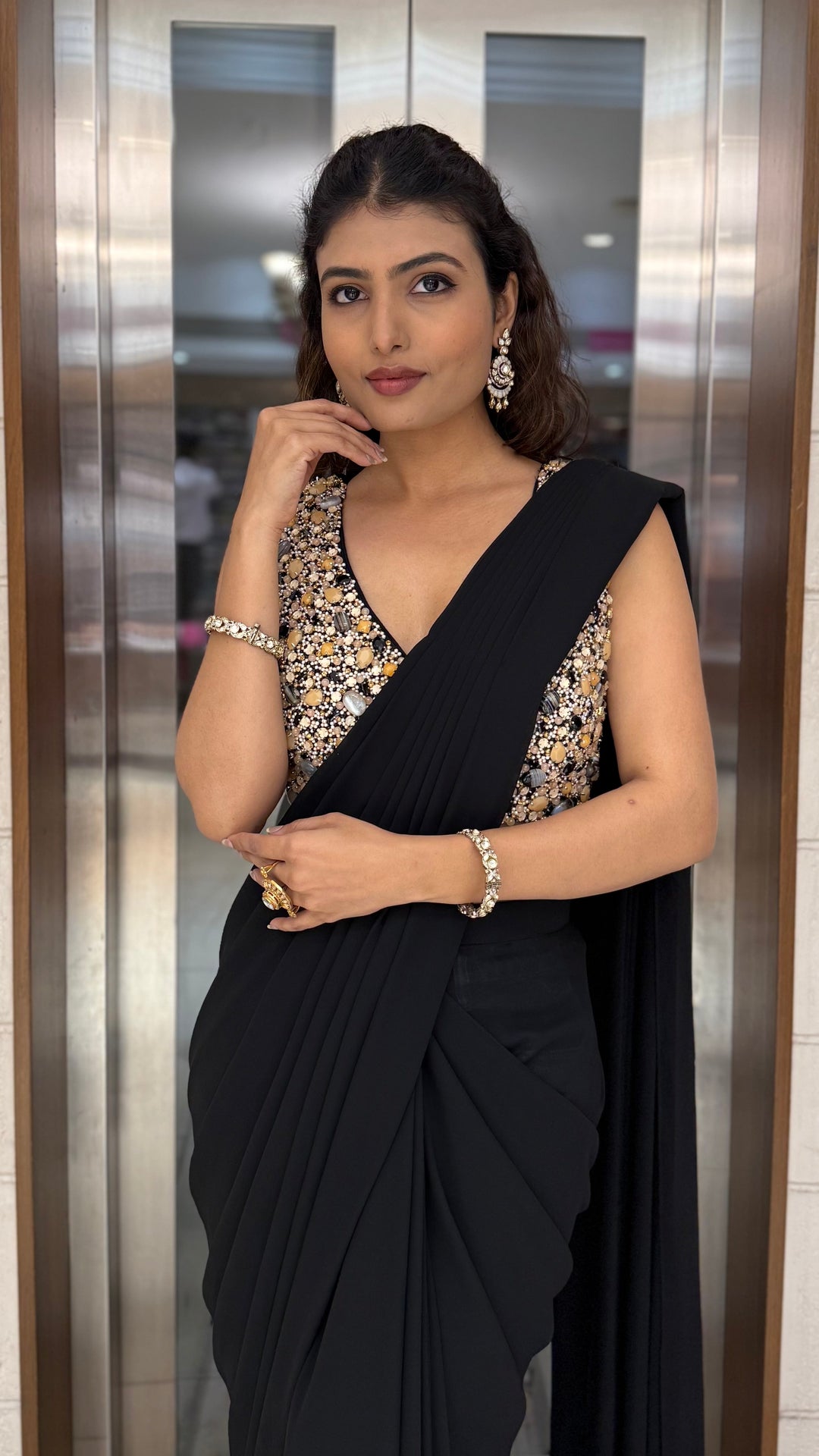 Classic Black Pre-Draped Saree with Gold Sequin Embellished Blouse