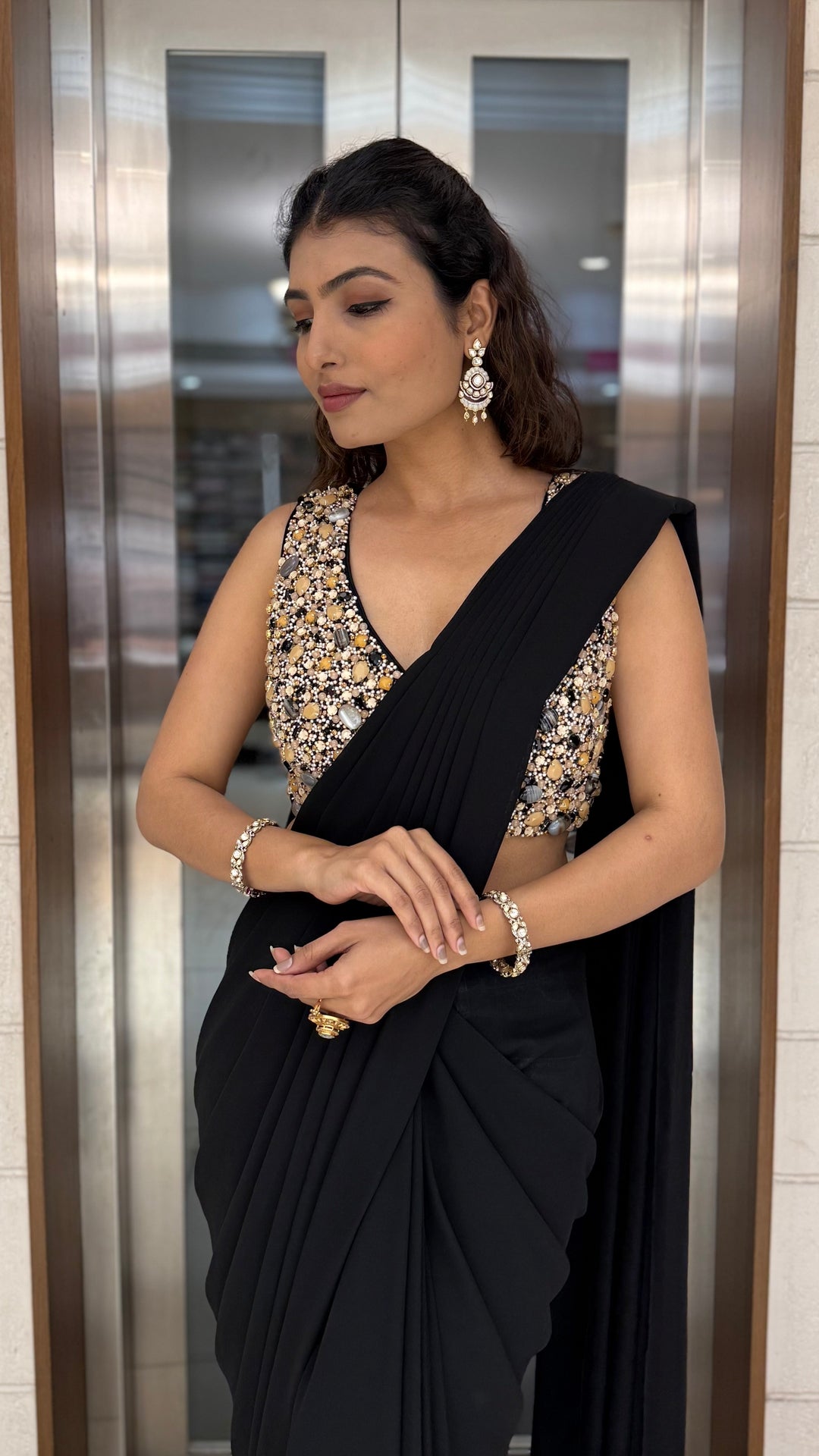 Classic Black Pre-Draped Saree with Gold Sequin Embellished Blouse