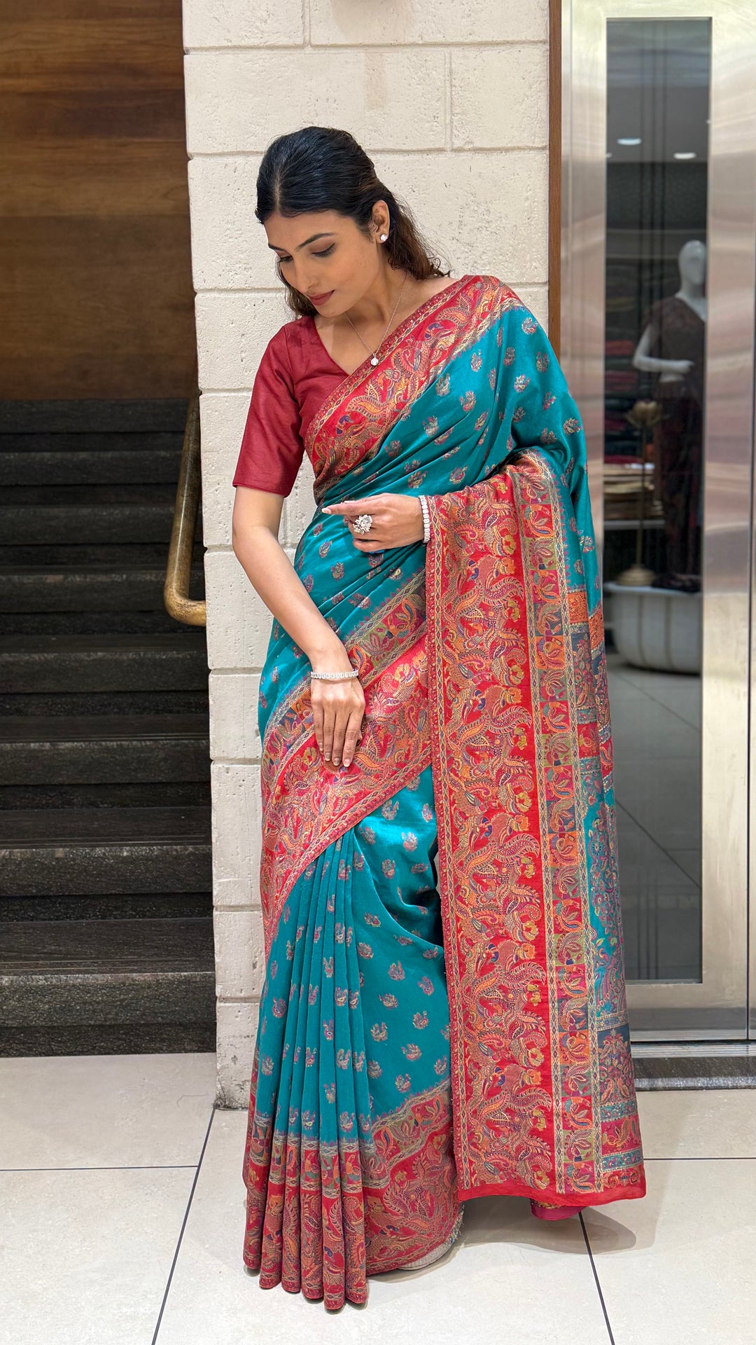 Teal Heritage Silk Saree with Rich Red Paisley Woven Border