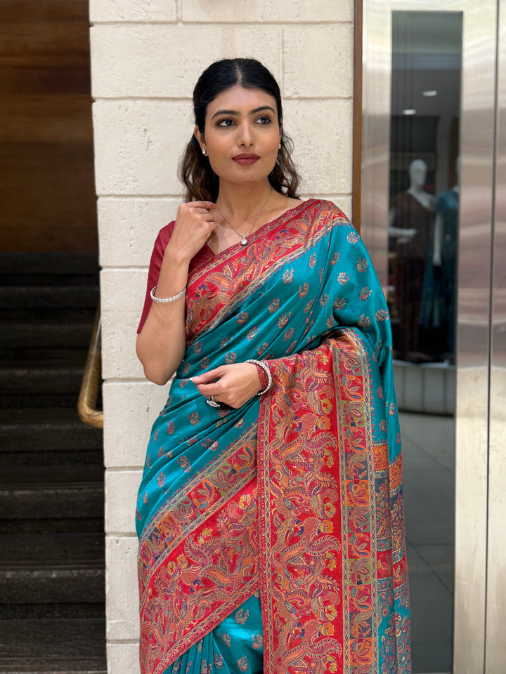 Teal Heritage Silk Saree with Rich Red Paisley Woven Border