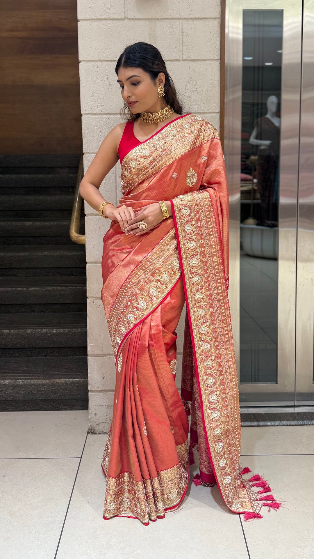 Rose Copper Banarasi Silk Saree with Intricate Zari Border & Tassel Pallu