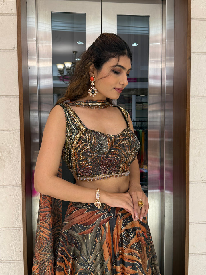 Rust Orange & Olive Leaf Print Lehenga with Embellished Blouse & Dupatta