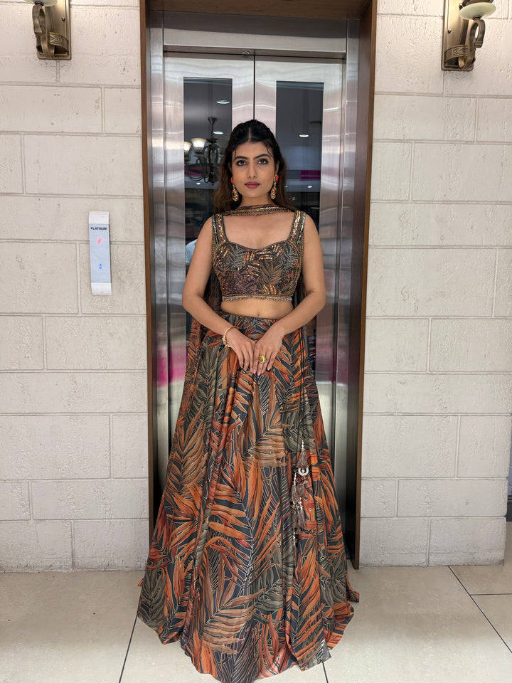 Rust Orange & Olive Leaf Print Lehenga with Embellished Blouse & Dupatta