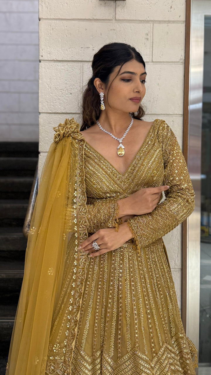 Antique Gold Hand-Embroidered Bridal Lehenga Set with Draped Dupatta