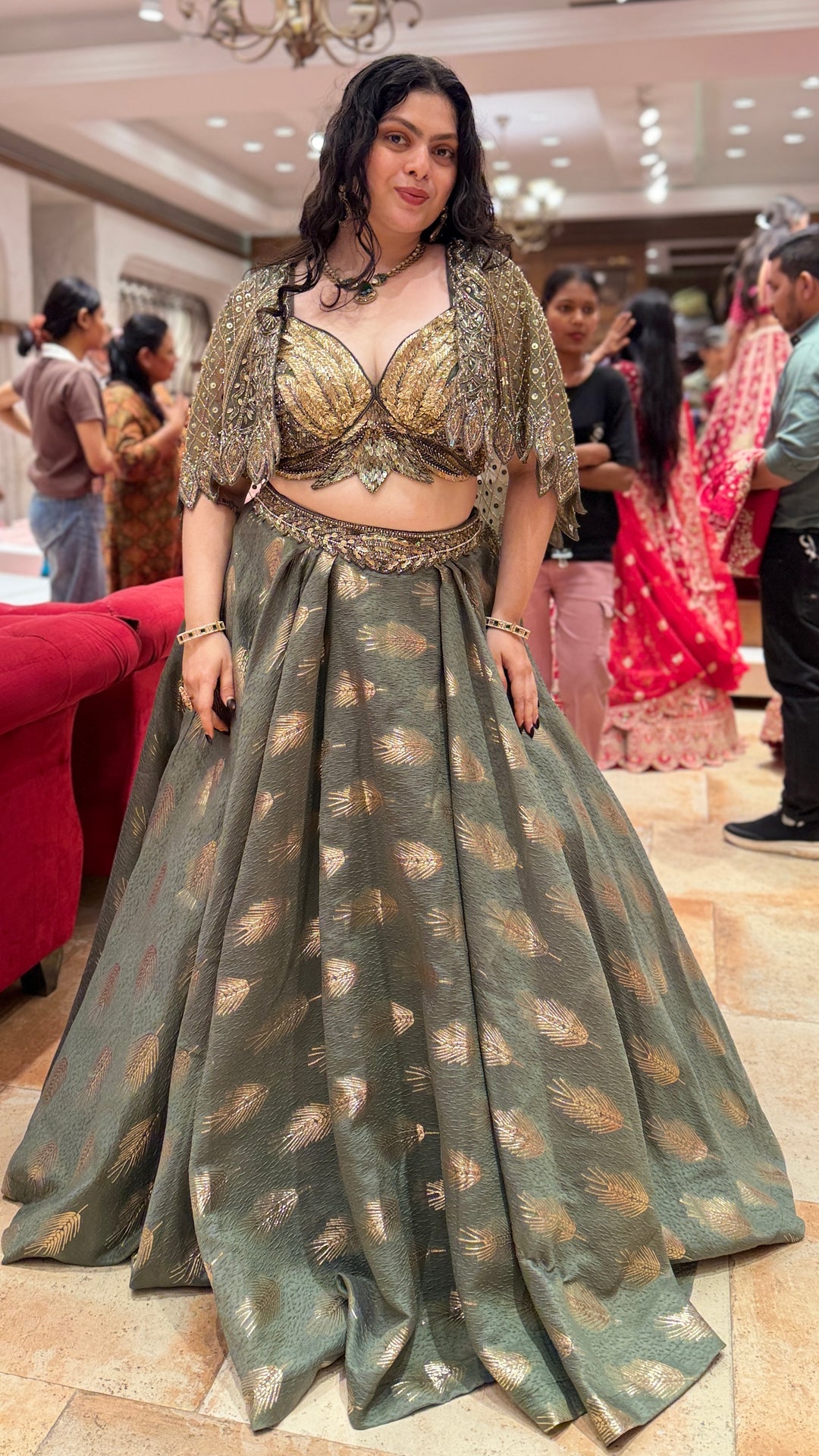 Olive Green Designer Lehenga Choli with Embellished Cape Sleeves