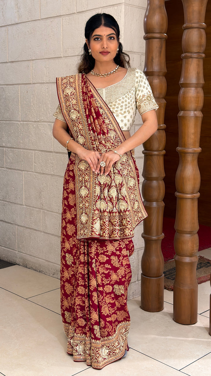 Royal Maroon Banarasi Saree with Intricate Gold Zari Weaving & Rich Traditional Pallu
