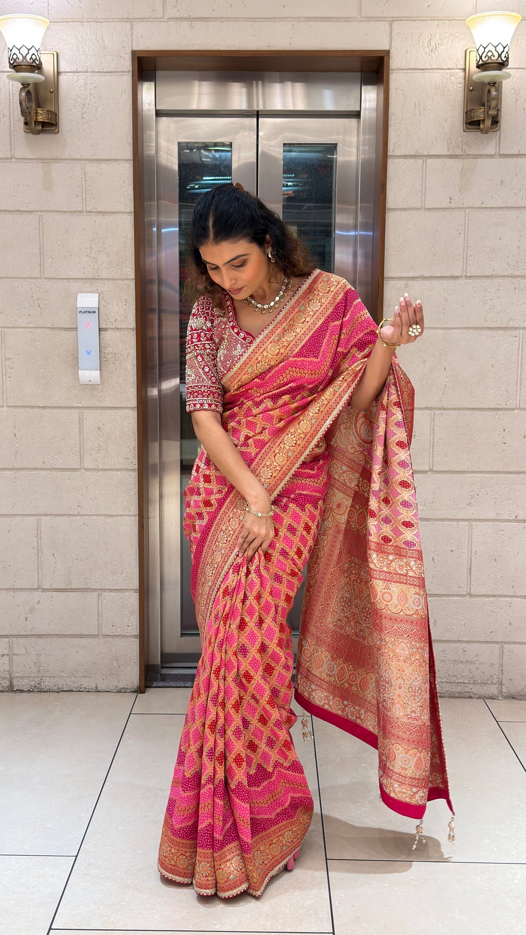 Rani Pink Banarasi Silk Saree with Rich Zari Weaving & Traditional Border