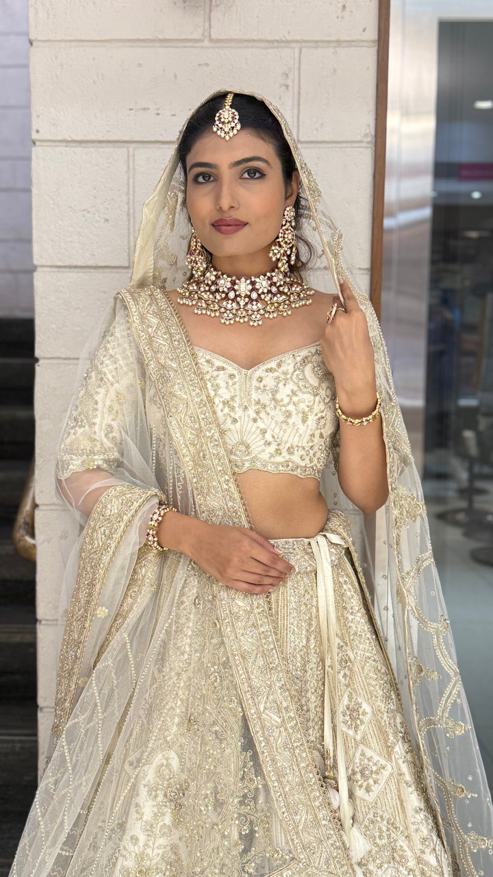 Ivory Gold Heavy Embroidered Bridal Lehenga with Net Dupatta – Royal Wedding Collection