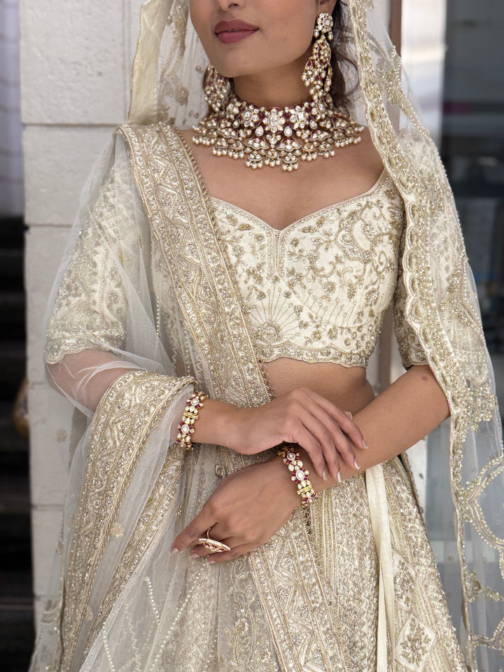 Ivory Gold Heavy Embroidered Bridal Lehenga with Net Dupatta – Royal Wedding Collection