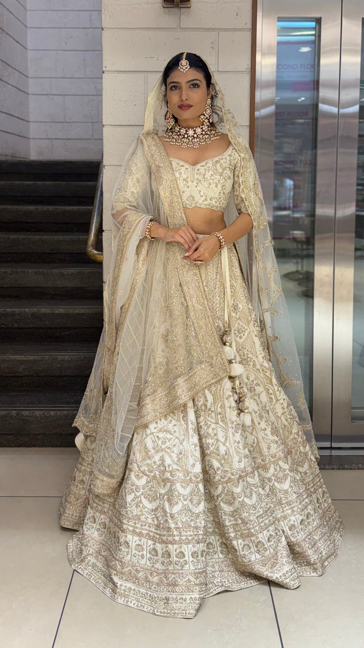 Ivory Gold Heavy Embroidered Bridal Lehenga with Net Dupatta – Royal Wedding Collection