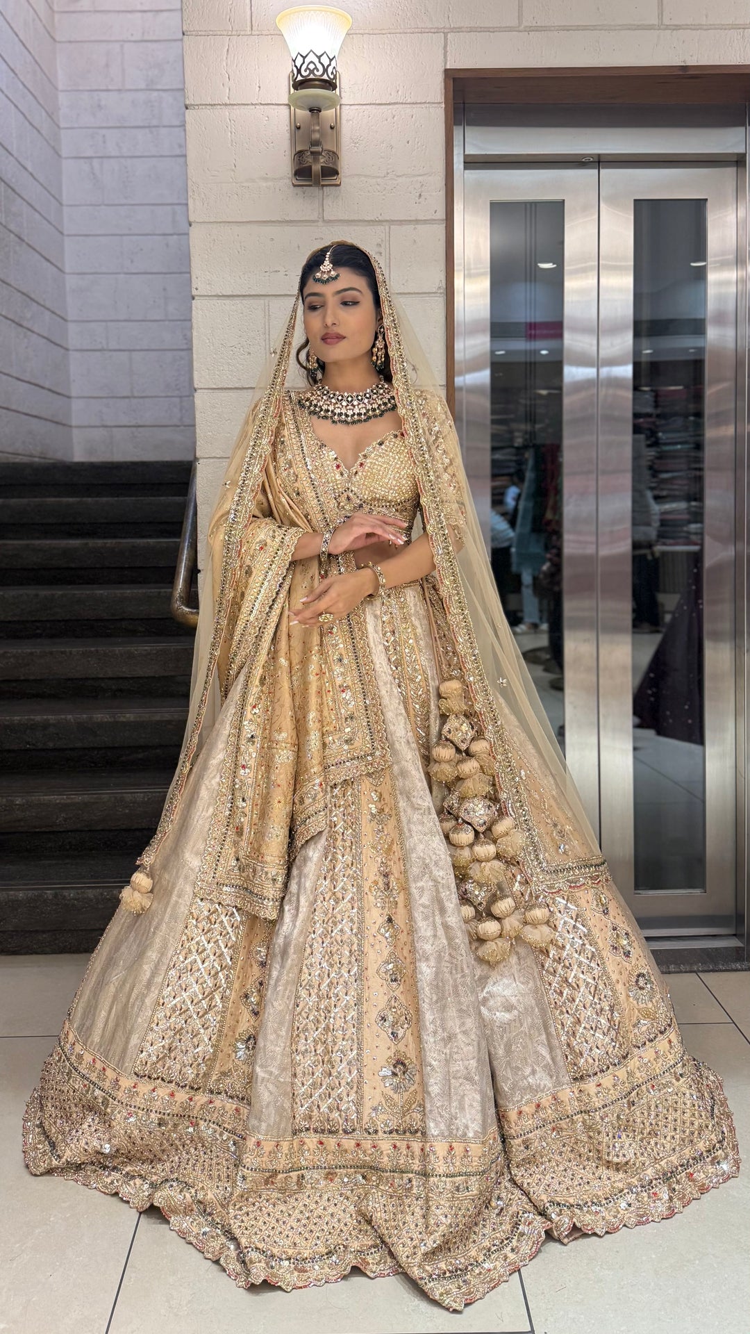Champagne Gold Heavy Embroidered Bridal Lehenga with Net Dupatta