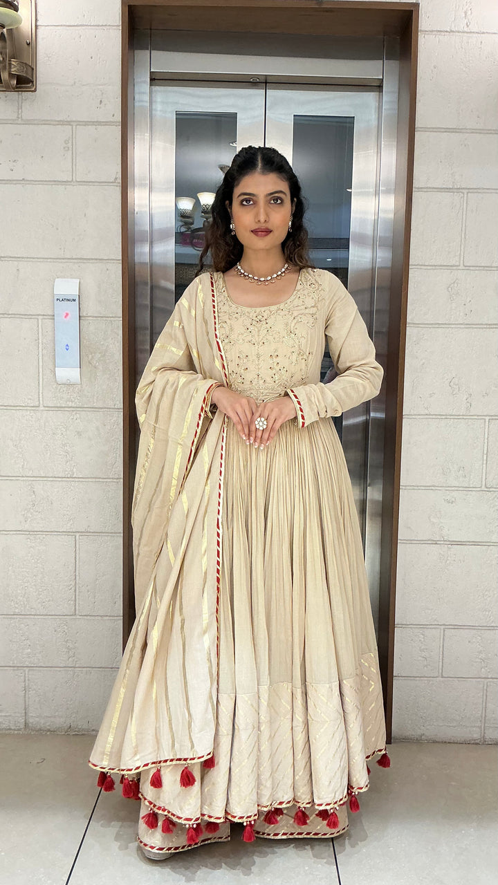 Elegant Beige Anarkali Suit Set with Tassel Dupatta