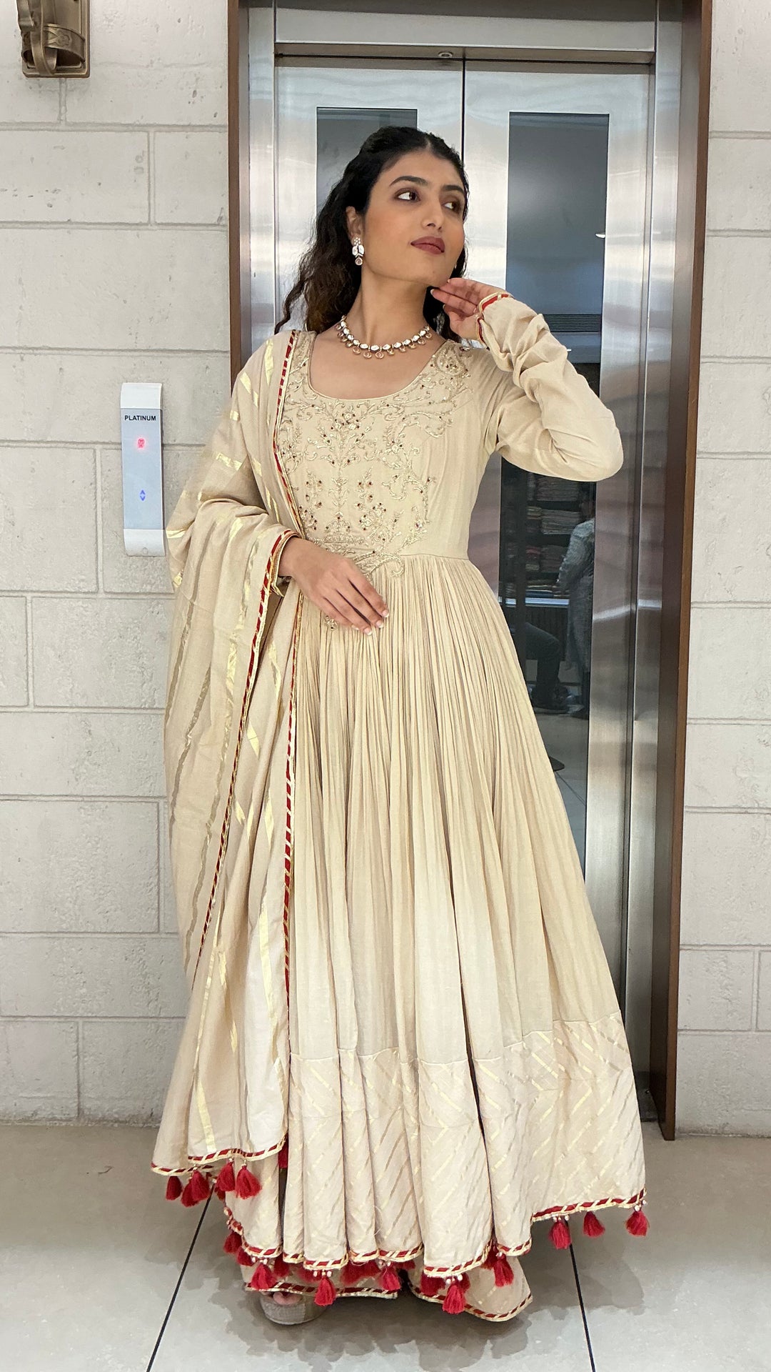Elegant Beige Anarkali Suit Set with Tassel Dupatta