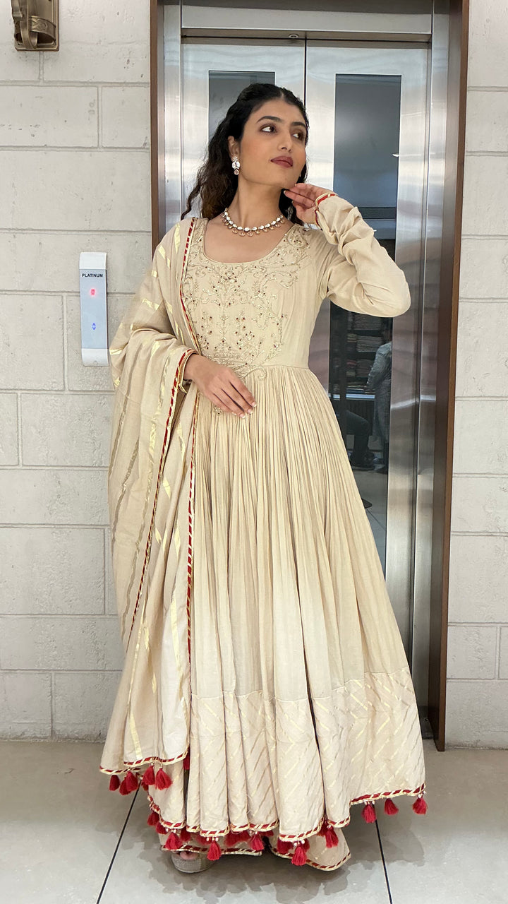 Elegant Beige Anarkali Suit Set with Tassel Dupatta