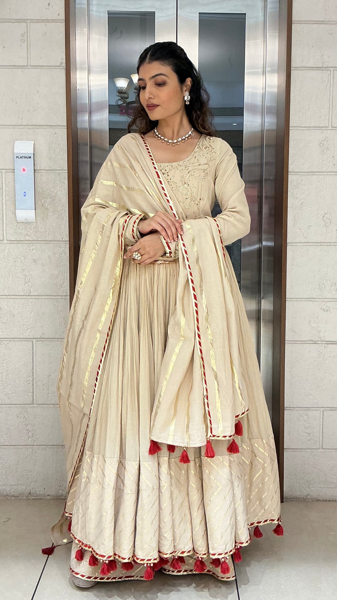 Elegant Beige Anarkali Suit Set with Tassel Dupatta