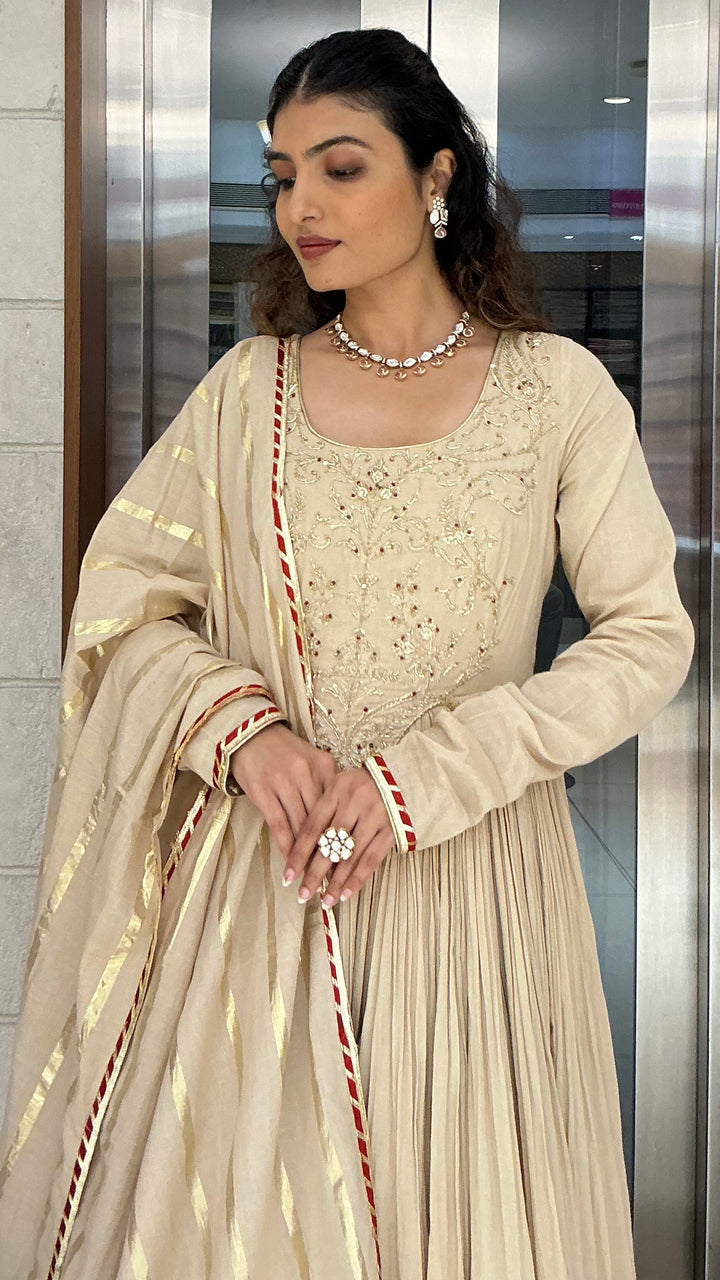 Elegant Beige Anarkali Suit Set with Tassel Dupatta