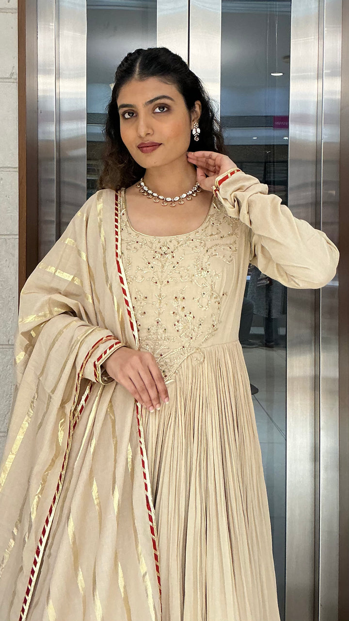 Elegant Beige Anarkali Suit Set with Tassel Dupatta