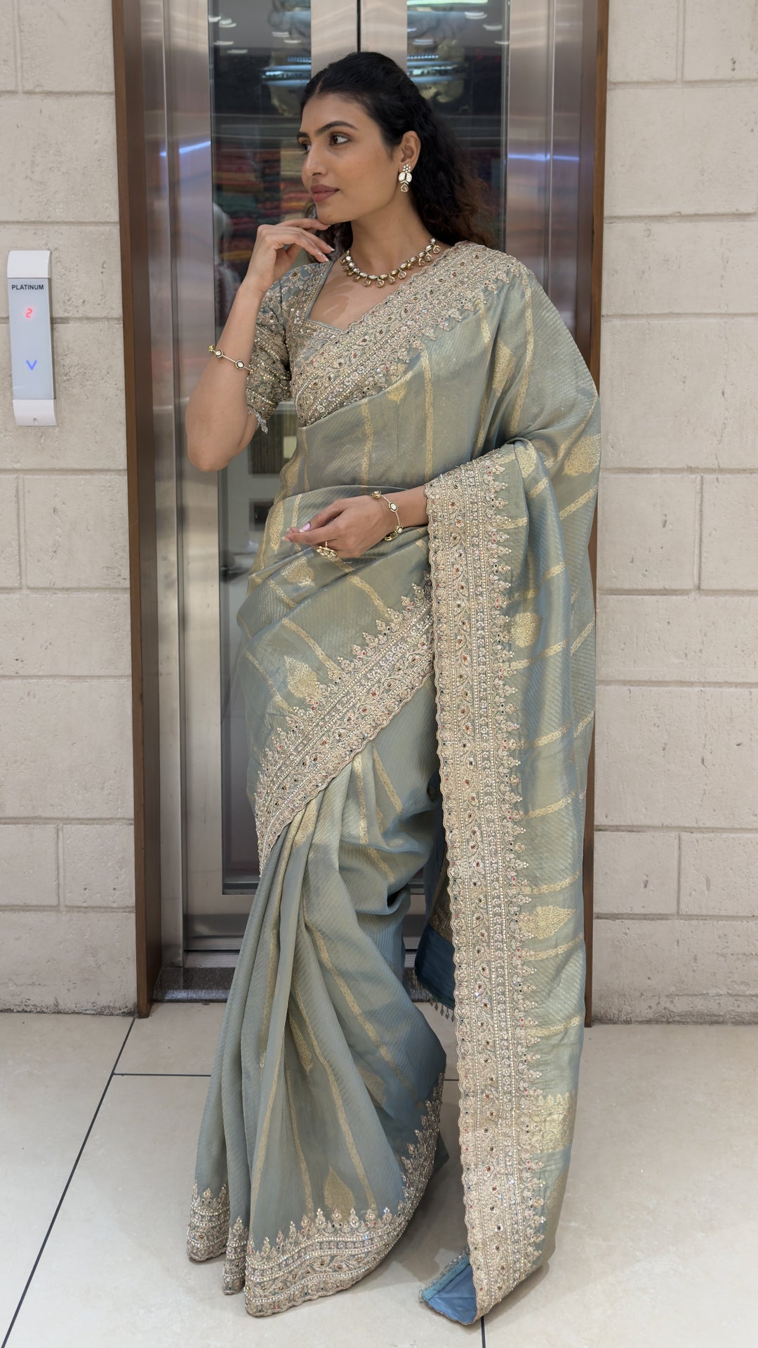 Sage Green Designer Weaving Saree with Zari Stripes & Hand Embellished Border