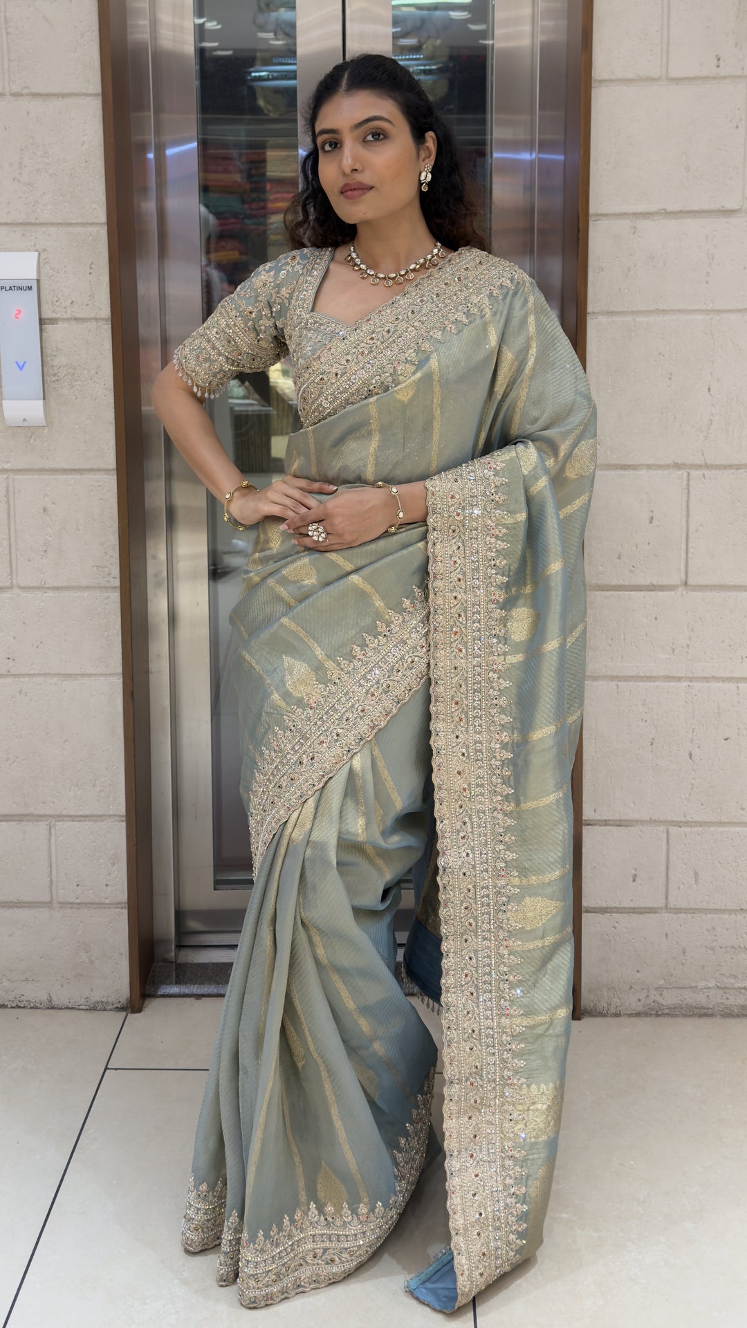 Sage Green Designer Weaving Saree with Zari Stripes & Hand Embellished Border