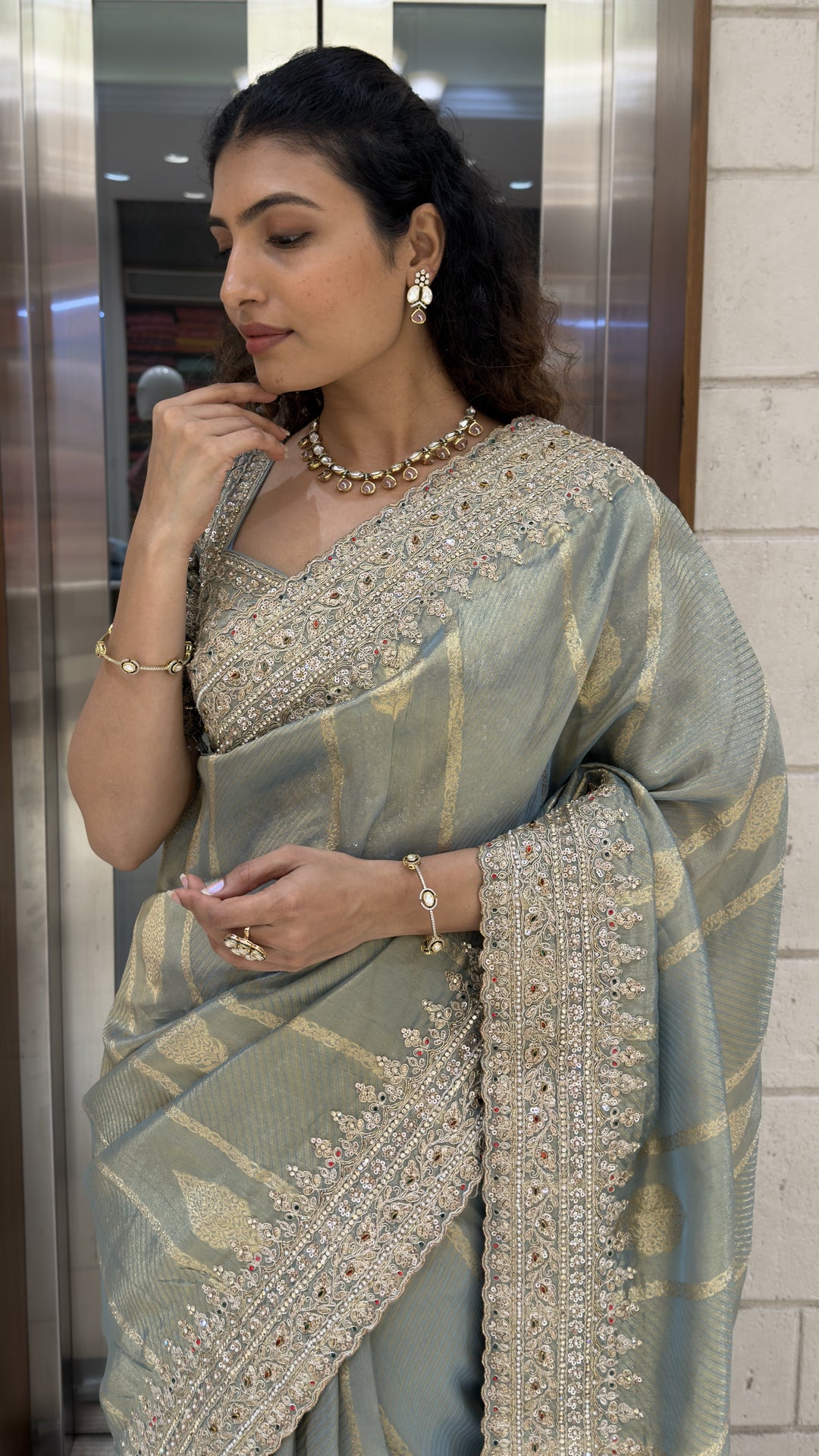 Sage Green Designer Weaving Saree with Zari Stripes & Hand Embellished Border