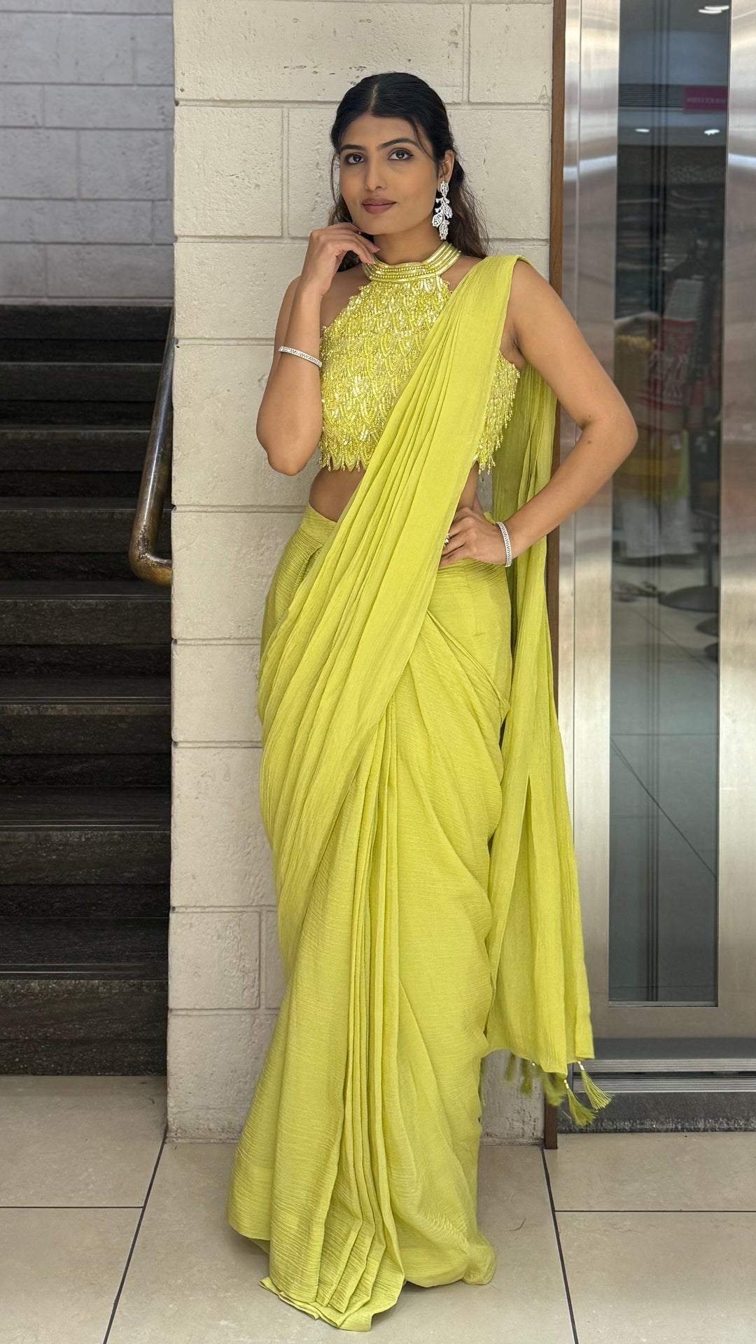 Lime Yellow Crinkle Pre-Draped Saree with Hand-Embroidered Halter Neck Blouse