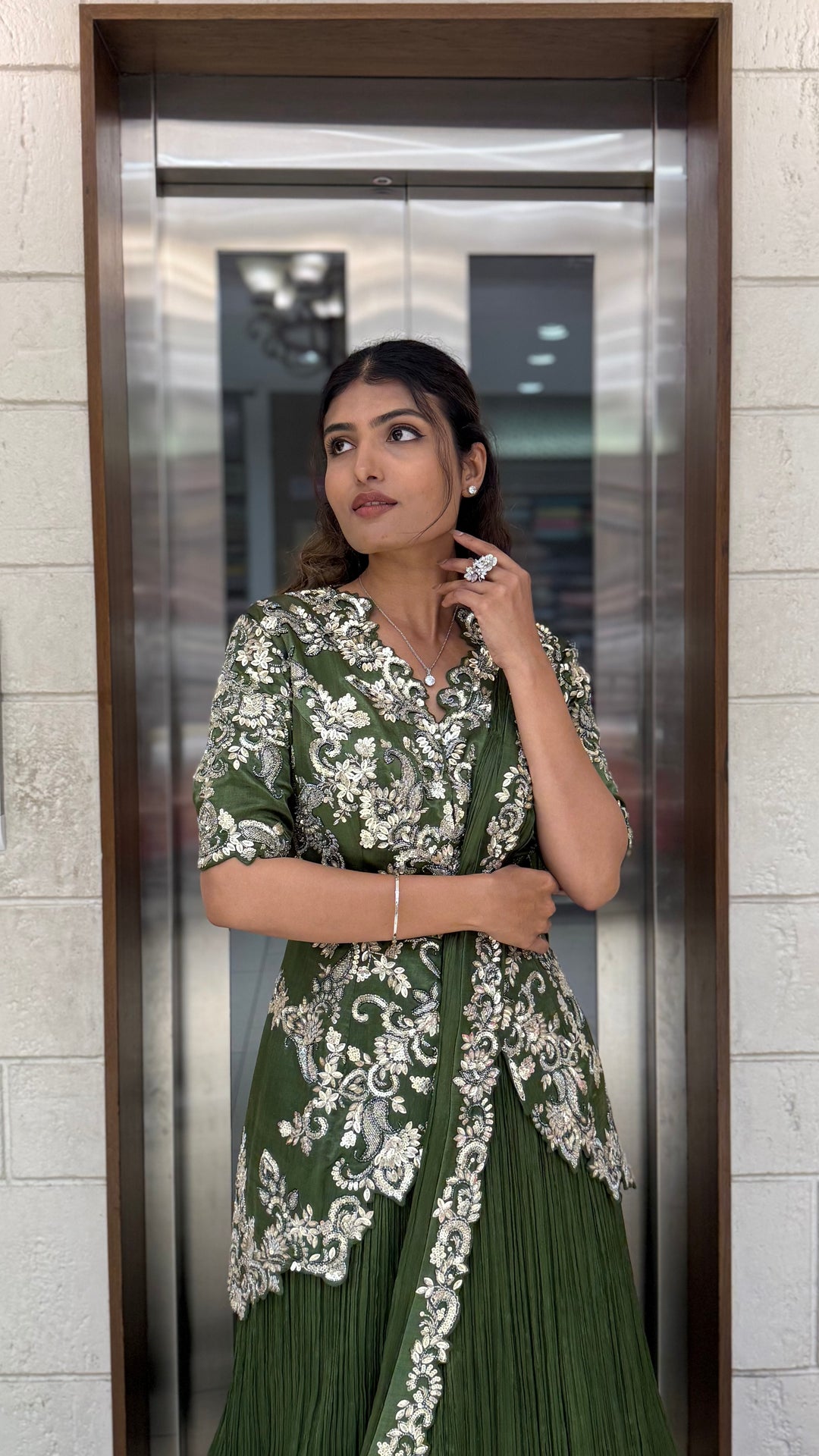 Olive Green Embroidered Anarkali Gown with Elegant Floral Handwork