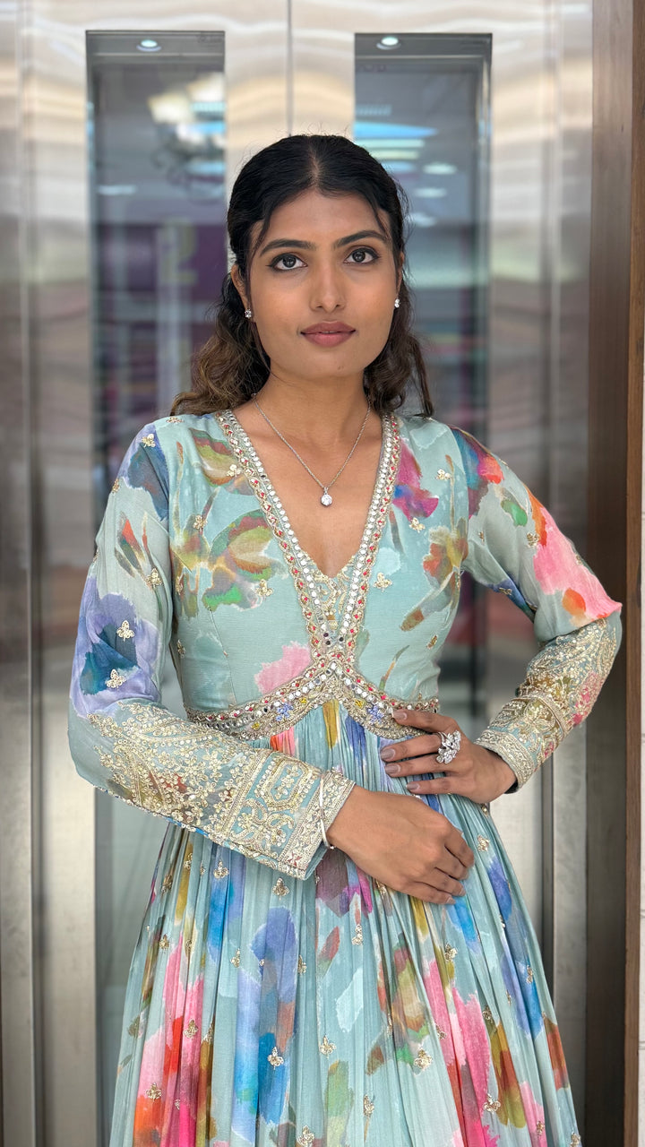 Pastel Aqua Floral Silk Anarkali Gown with Hand-Embellished Border & Elegant V-Neck Detailing