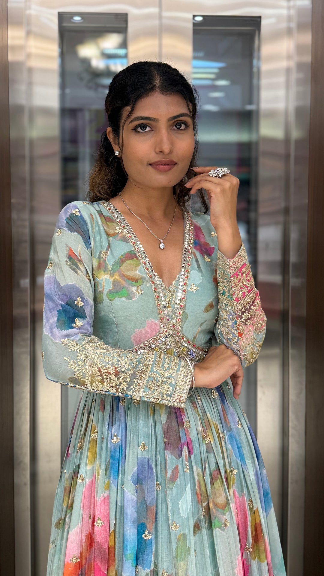 Pastel Aqua Floral Silk Anarkali Gown with Hand-Embellished Border & Elegant V-Neck Detailing